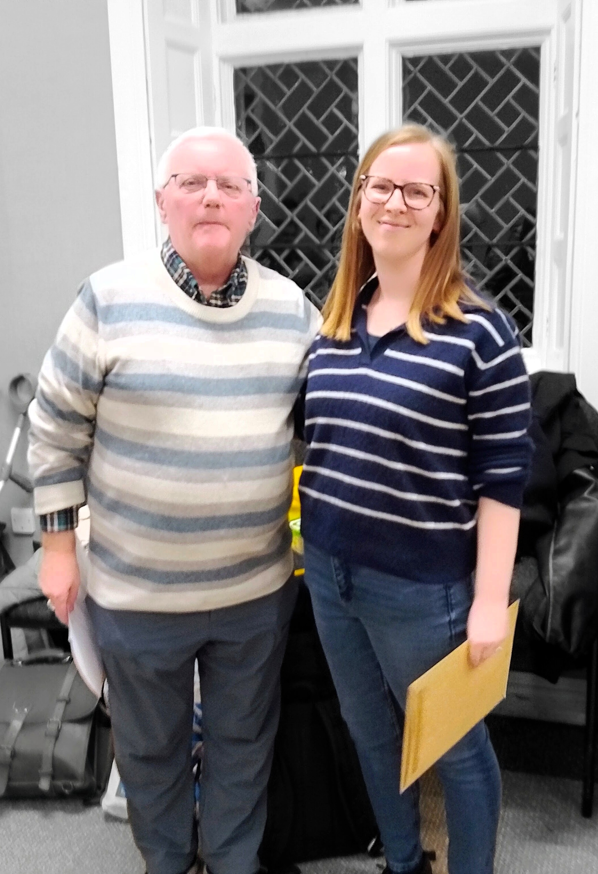 Laura Atkinson standing with Mark Ormrod's partner Richard Dobson